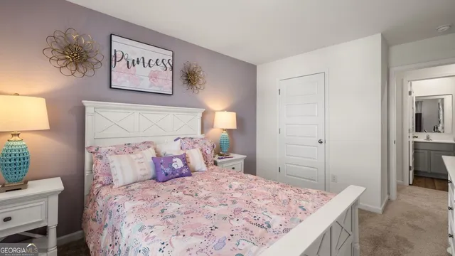 a bedroom with a bed and a table in it