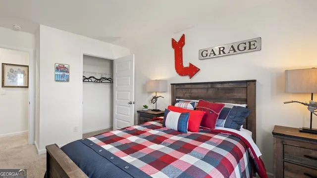 a bed room with a bed and a fireplace