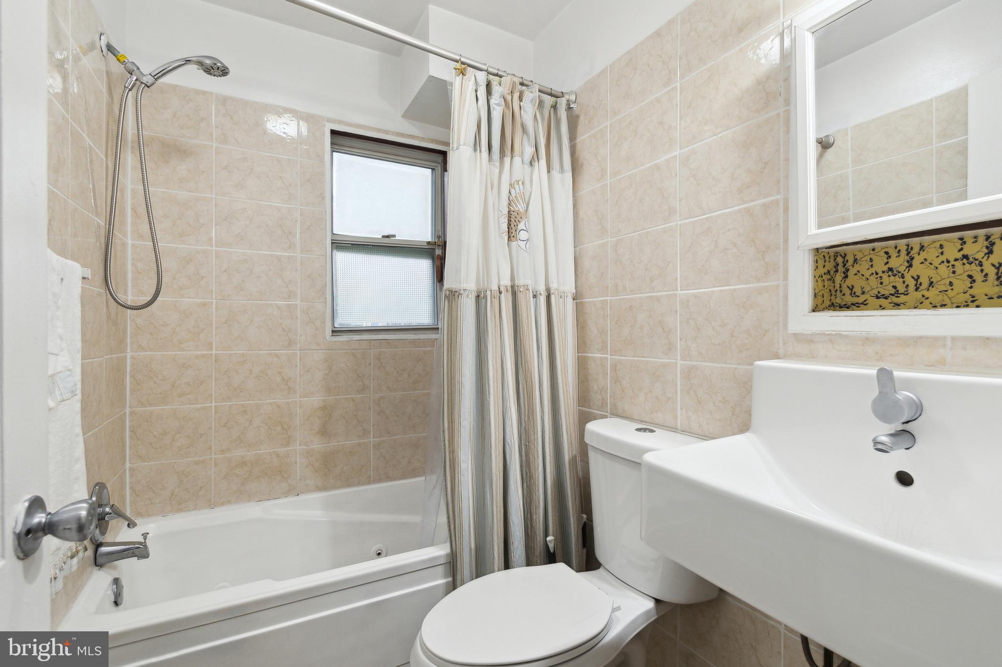 9920 Cottrell Terrace Silver Spring, MD 20903 - Photo 13 of 35 Main level full bathroom