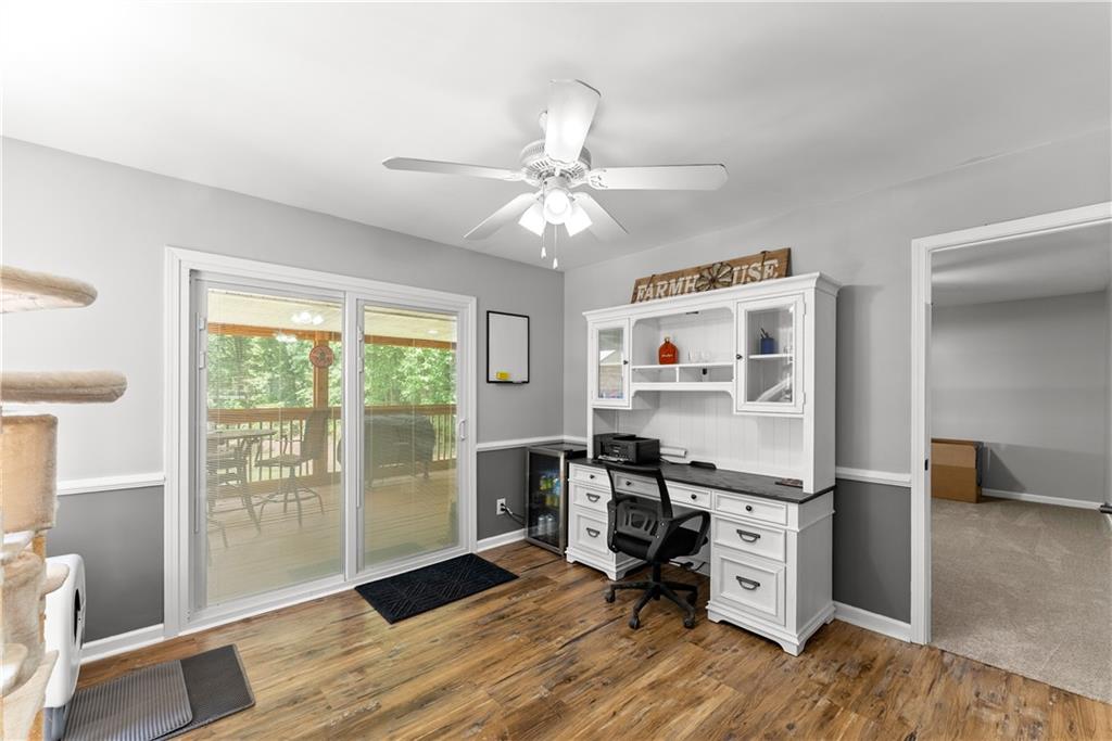 1405 Tapp Wood Road Hoschton, GA 30548 - Photo 17 of 44 a workspace with wooden floor and a window