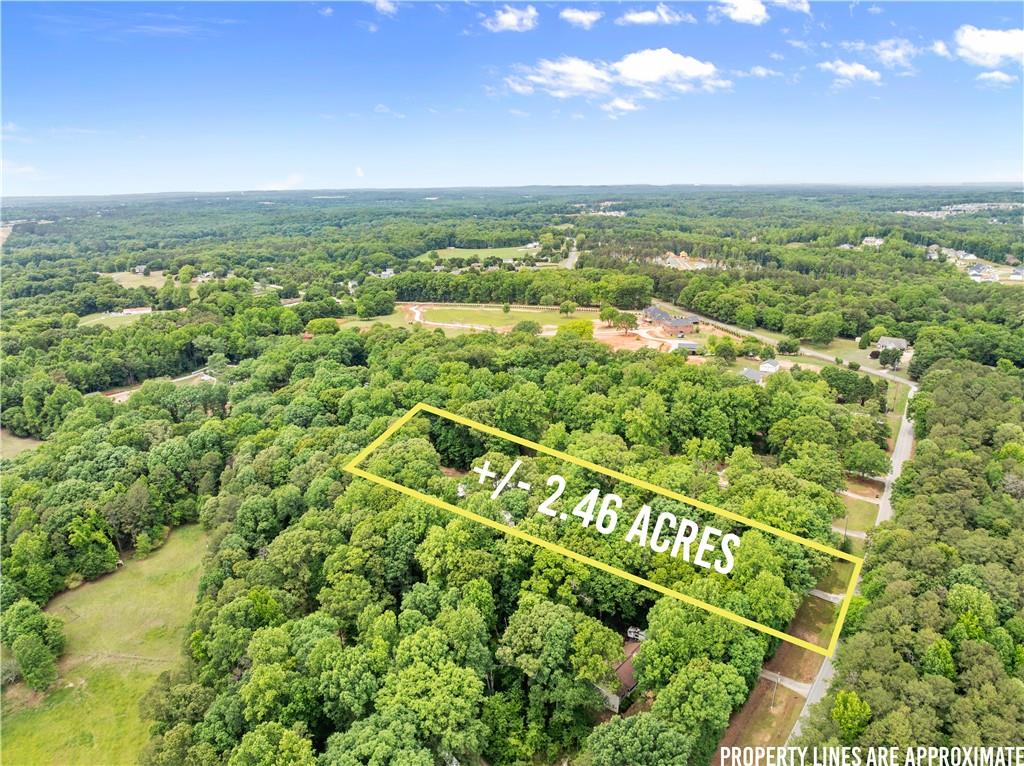 1405 Tapp Wood Road Hoschton, GA 30548 - Photo 2 of 44 a view of a city