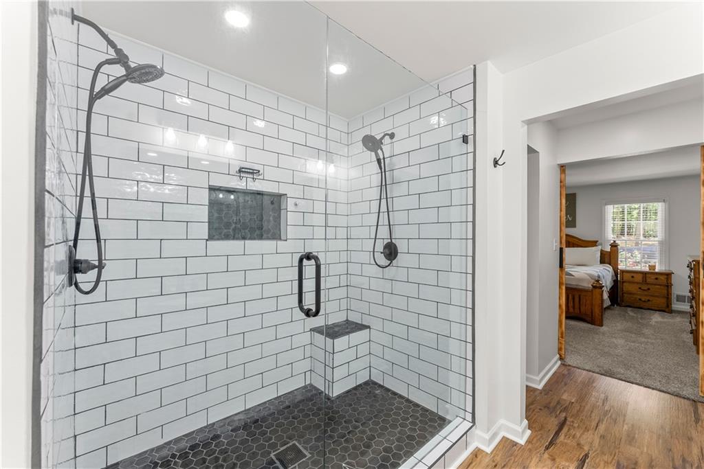 1405 Tapp Wood Road Hoschton, GA 30548 - Photo 24 of 44 a bathroom with a shower