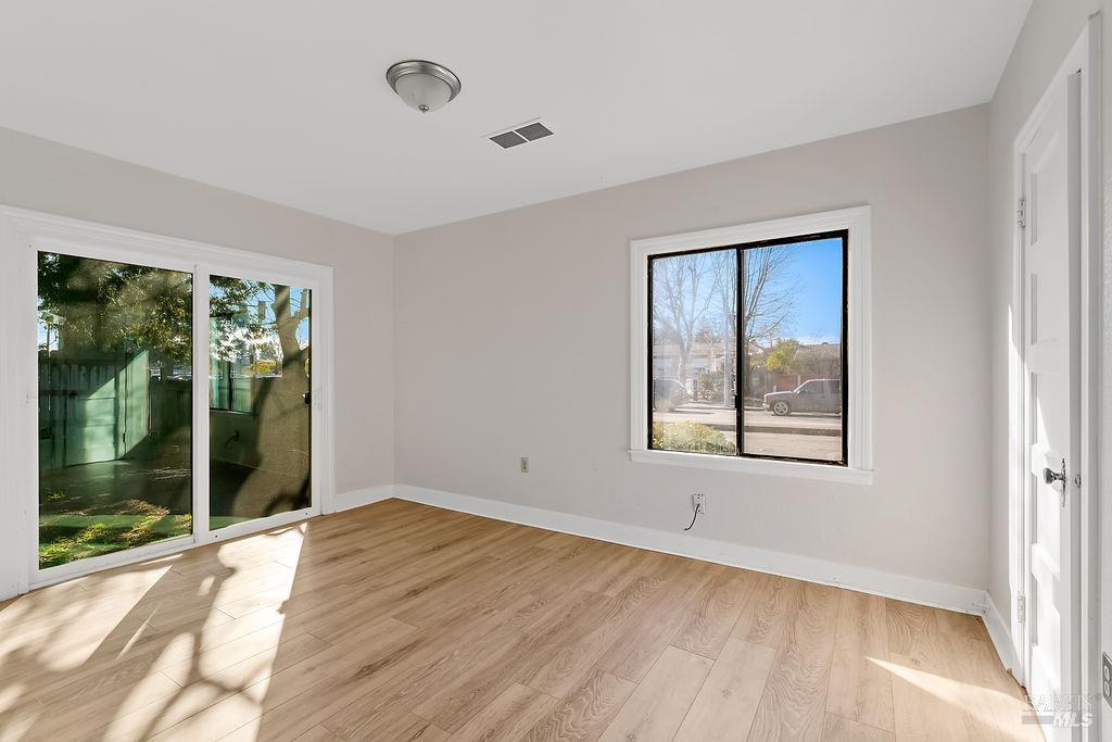 2050 Marlow Road Santa Rosa, CA 95403 - Photo 17 of 48 Bedroom 1 has a slider that flows out to a private backyard