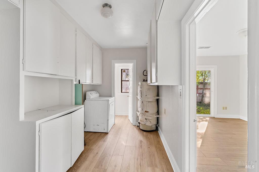 2050 Marlow Road Santa Rosa, CA 95403 - Photo 24 of 48 Laundry Room has a 1/2 Bathroom attached