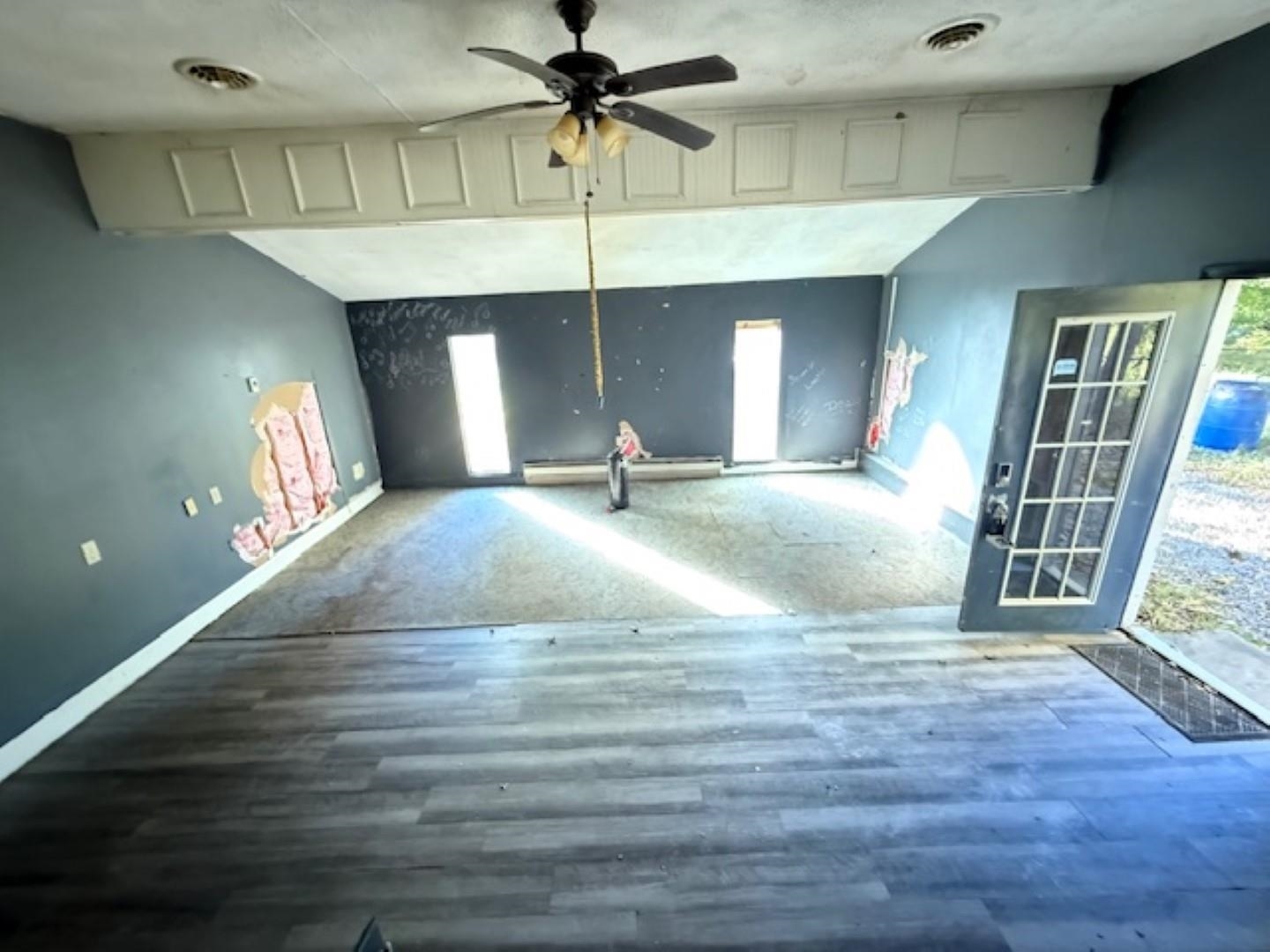 11035 Avery Road West Frankfort, IL 62896 - Photo 11 of 11 a view of an empty room with window and wooden floor