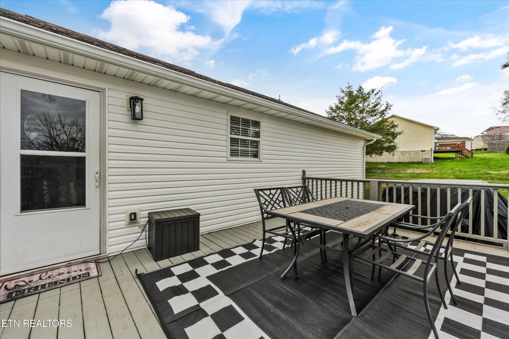 1306 Tabitha Drive White Pine, TN 37890 - Photo 19 of 31 a balcony with table and chairs