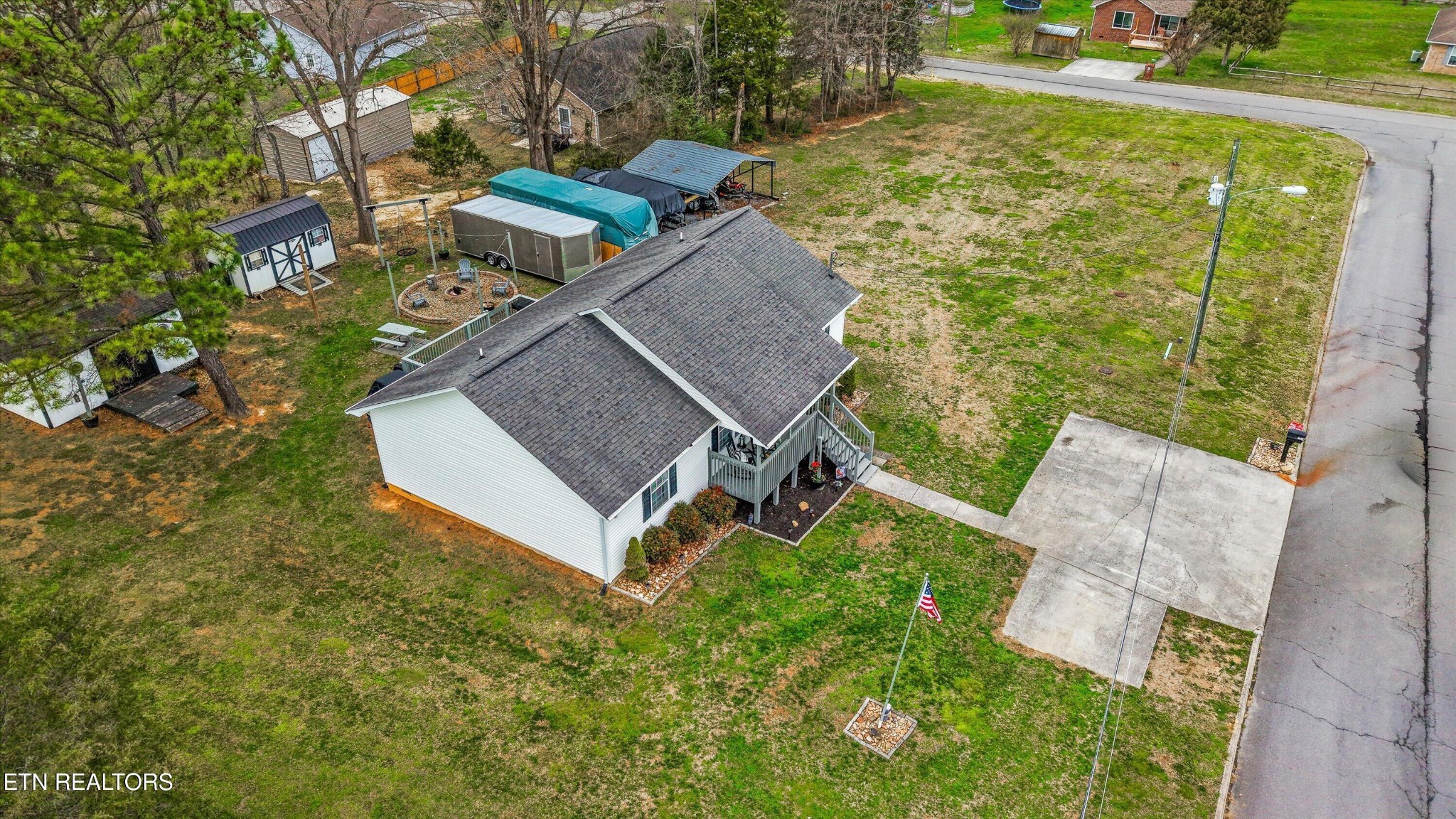1306 Tabitha Drive White Pine, TN 37890 - Photo 23 of 31 an aerial view of a house with swimming pool and large trees