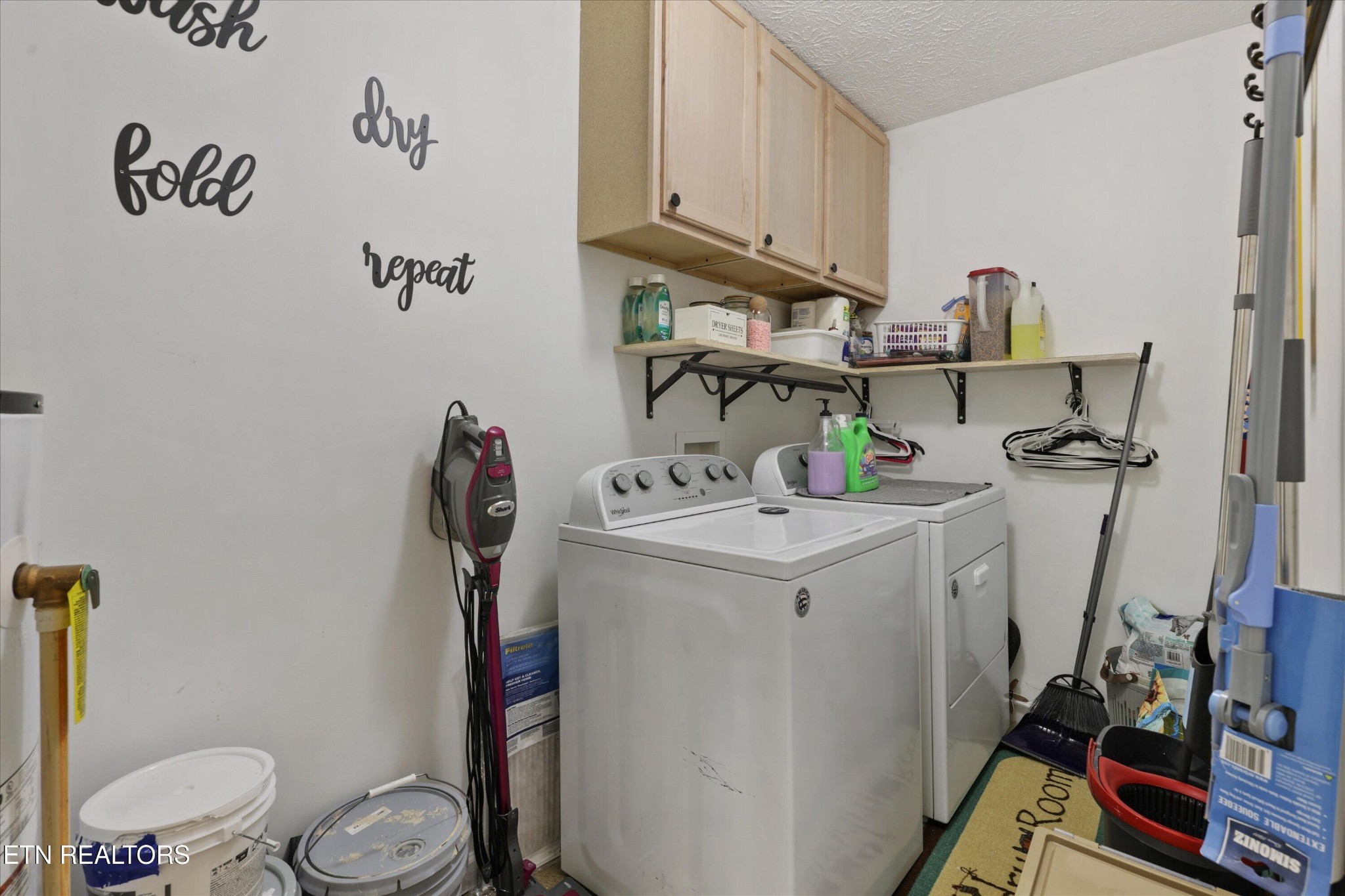 1306 Tabitha Drive White Pine, TN 37890 - Photo 29 of 31 a bathroom with a sink a toilet and a mirror