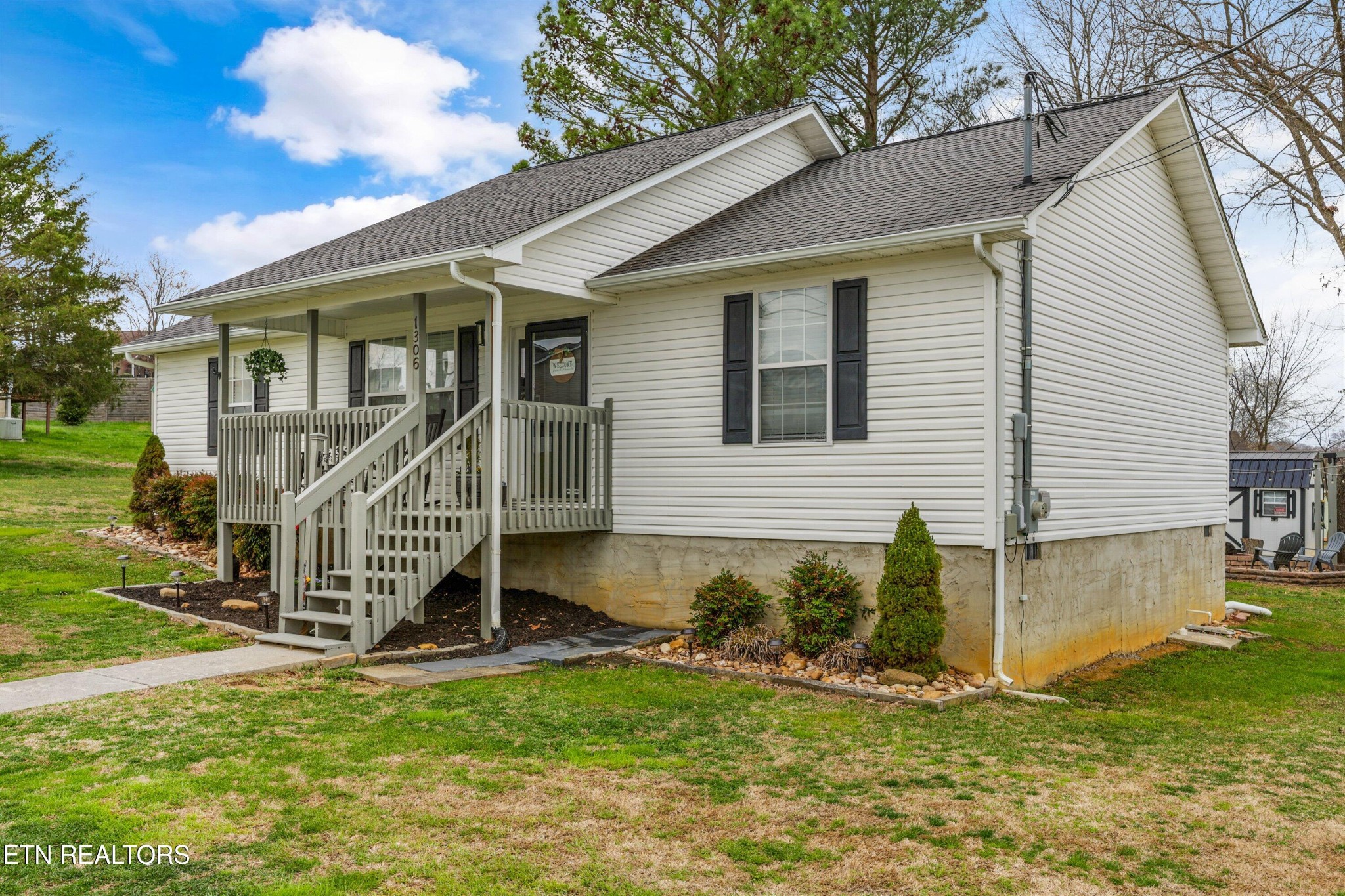 1306 Tabitha Drive White Pine, TN 37890 - Photo 31 of 31 a view of a house with a yard