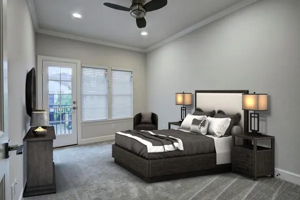 a bedroom with furniture and a flat screen tv