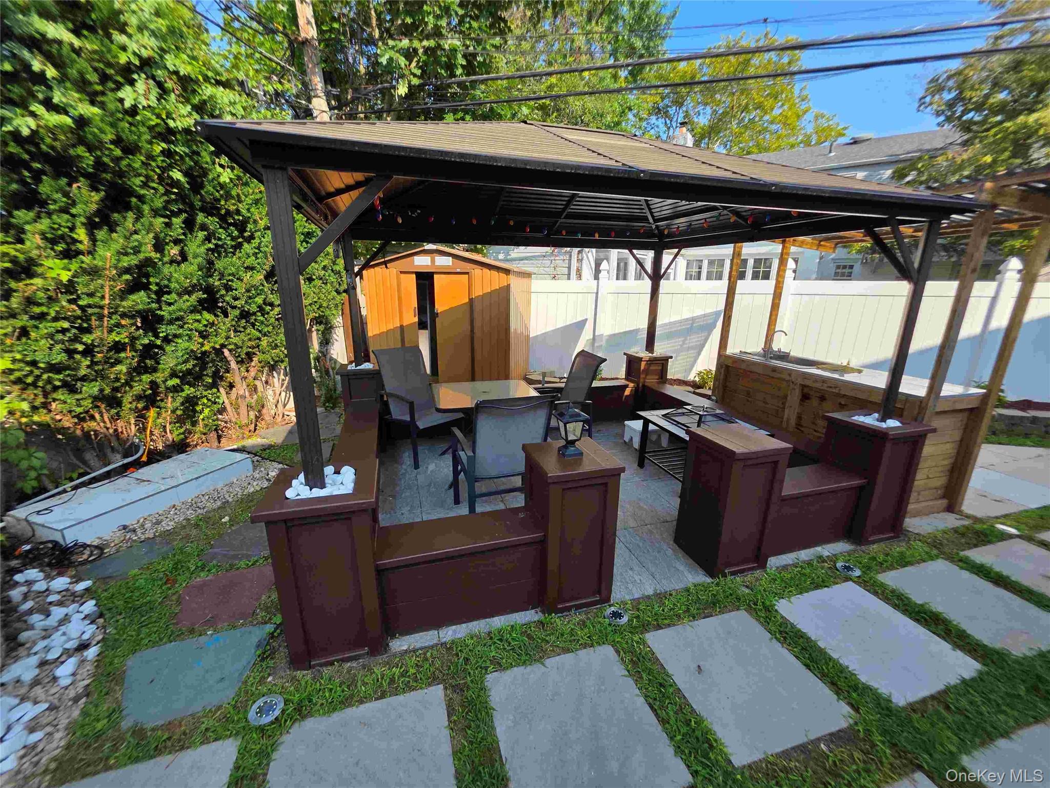 30 Aberdeen Road New Hyde Park, NY 11040 - Photo 19 of 37 a view of yard from outdoor seating