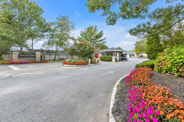 a view of a street with cars