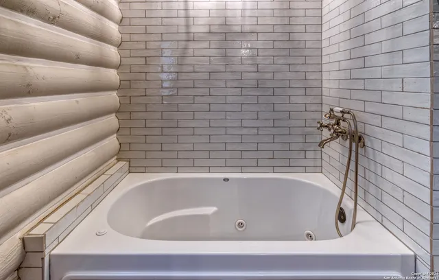 a bathroom with a bathtub