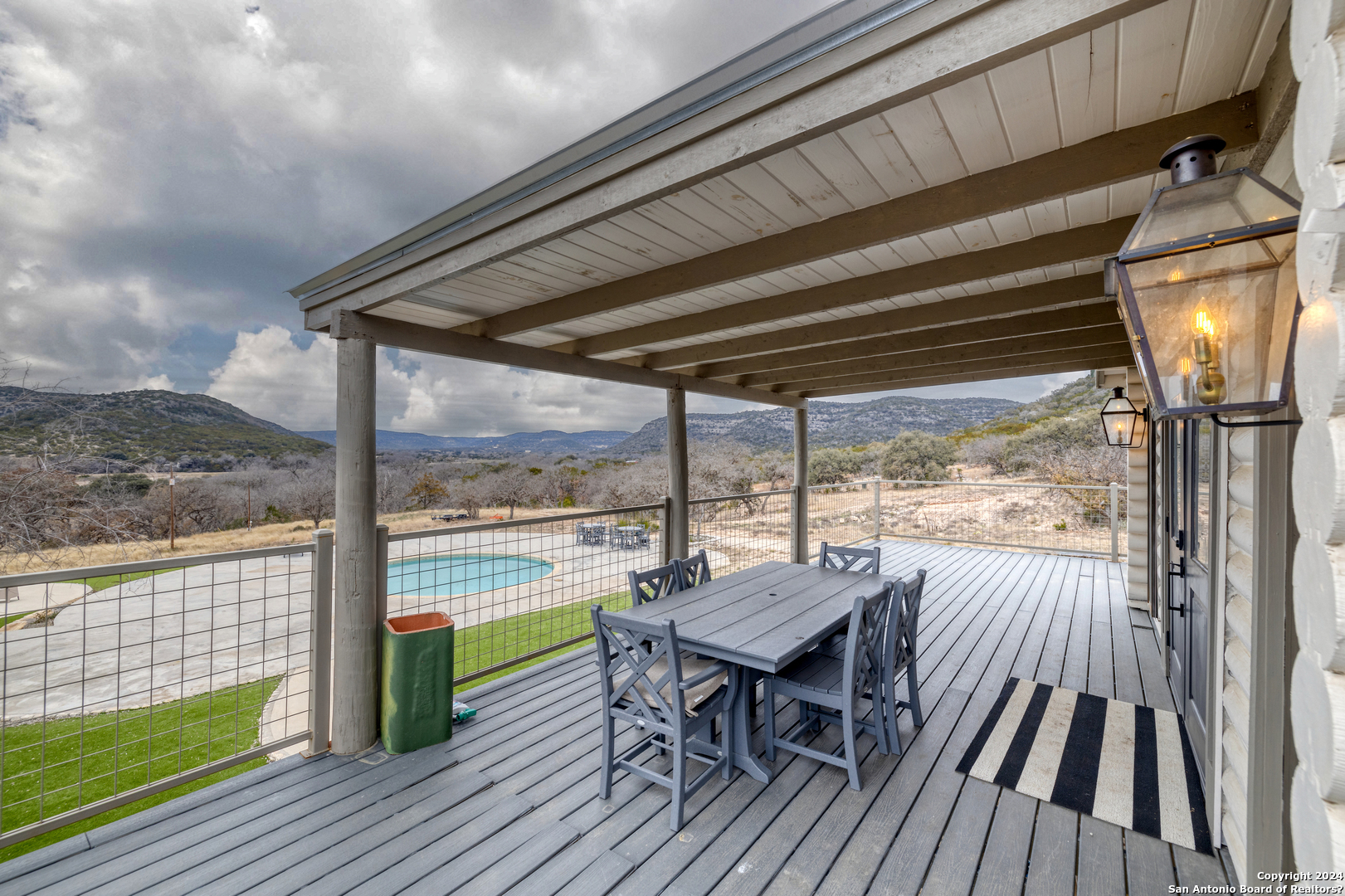 254 North Fork Bonner Road Leakey, TX 78873 - Photo 27 of 47 a view of a chairs and table in the balcony