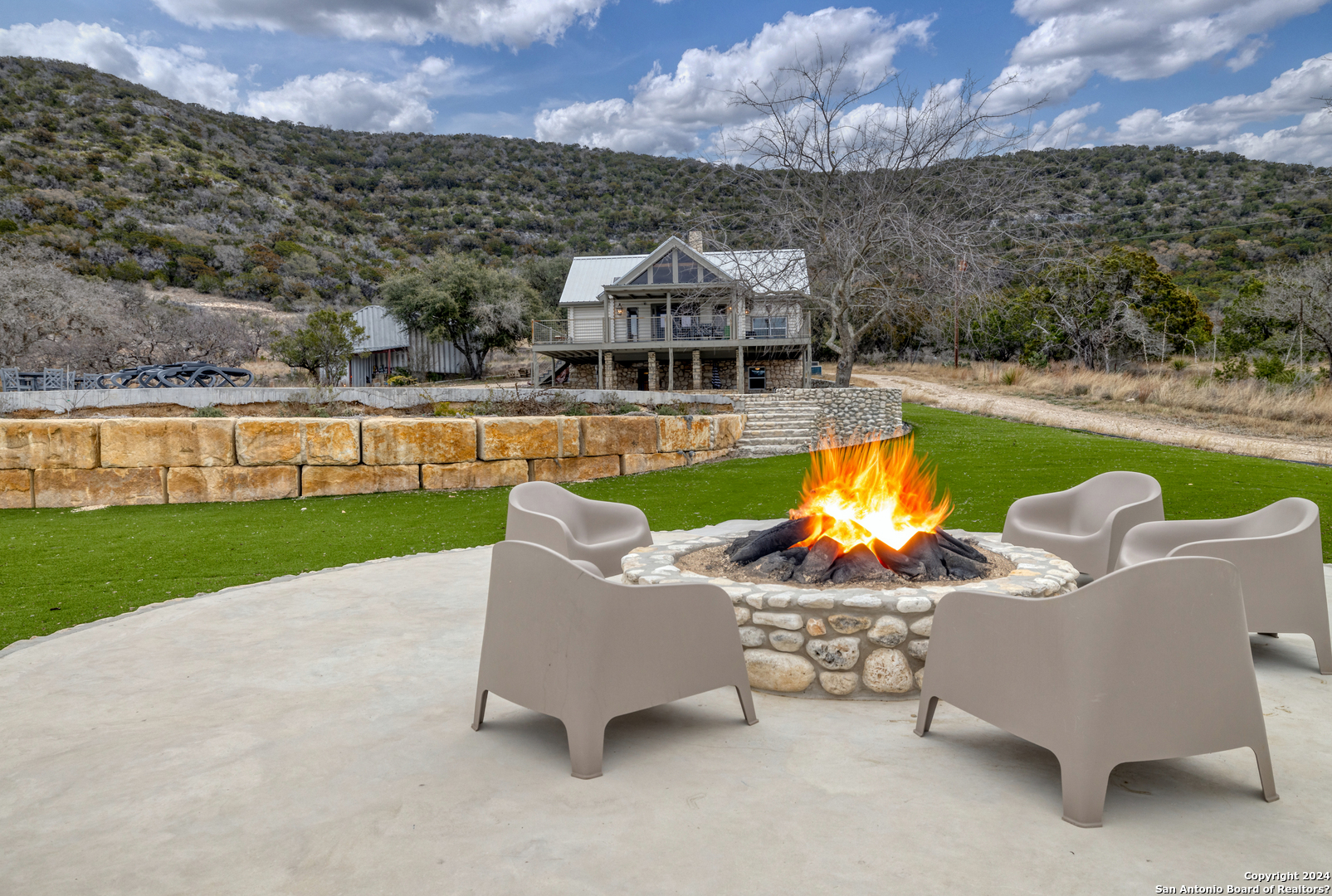 254 North Fork Bonner Road Leakey, TX 78873 - Photo 32 of 47 a view of a swimming pool with a lounge chair