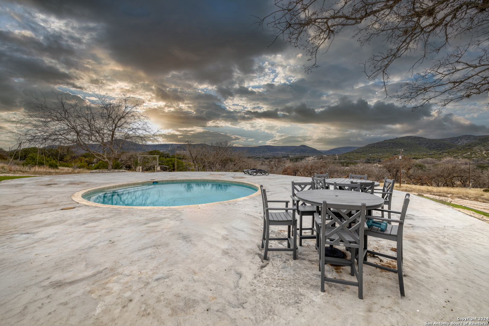 254 North Fork Bonner Road Leakey, TX 78873 - Photo 33 of 47 a view of a swimming pool with a lounge chair