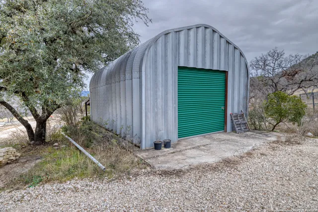 a view of backyard with green space
