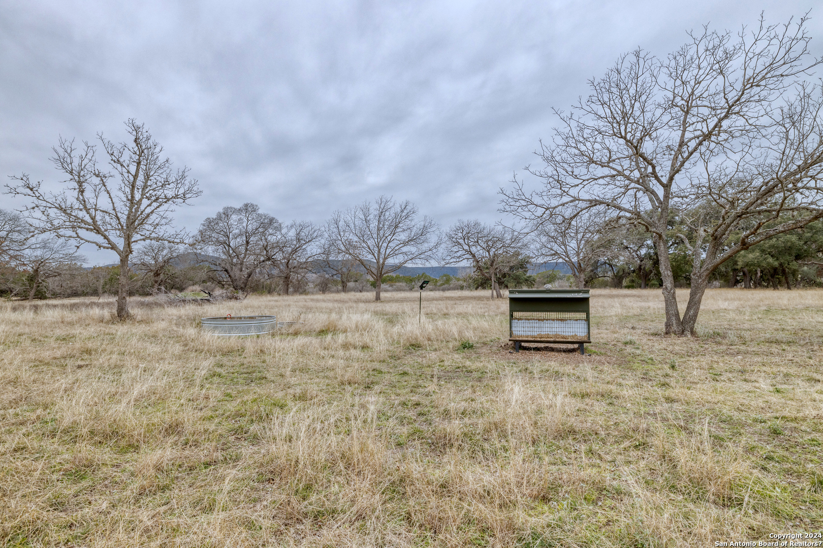 254 North Fork Bonner Road Leakey, TX 78873 - Photo 38 of 47 a view of bench sitting in middle of yard