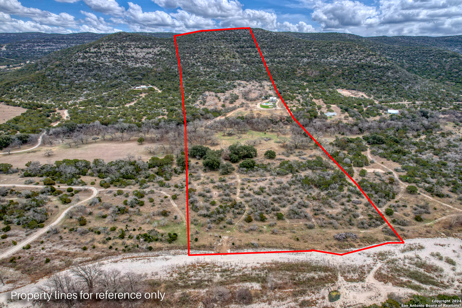 254 North Fork Bonner Road Leakey, TX 78873 - Photo 42 of 47 a view of a yard with wooden fence