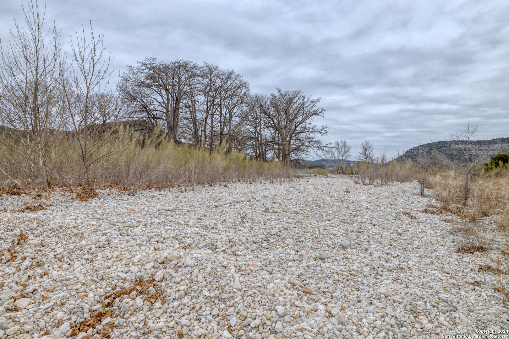 254 North Fork Bonner Road Leakey, TX 78873 - Photo 46 of 47 a view of lake view with beach and trees