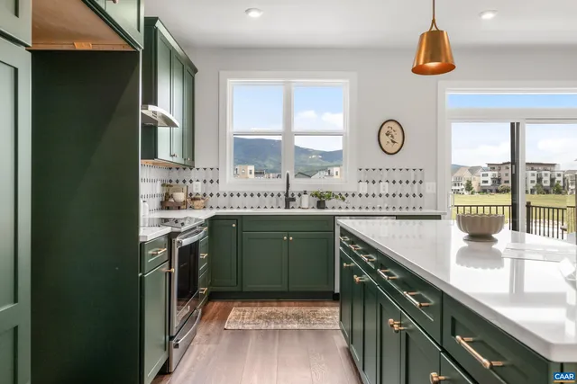 a kitchen with a sink and a stove