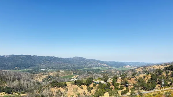 a view of lake and mountain