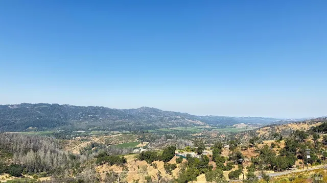 a view of lake and mountain
