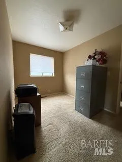 a room with furniture and window