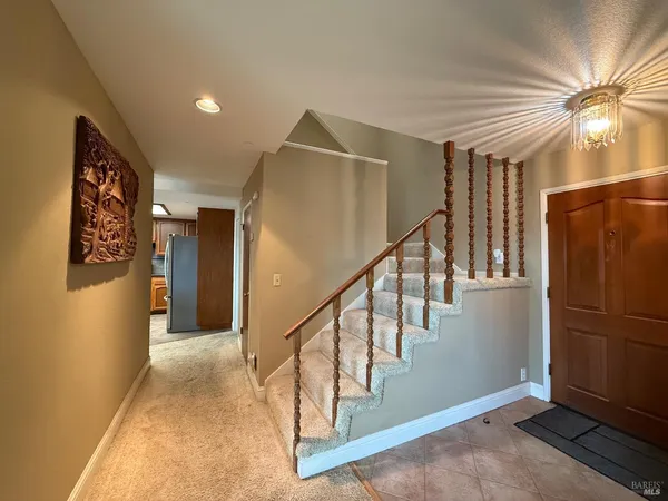 a view of hallway with stairs