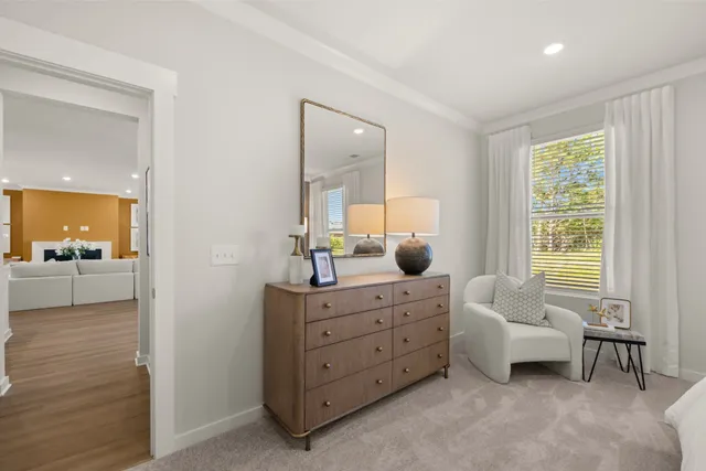 a bathroom with a shower sink and mirror