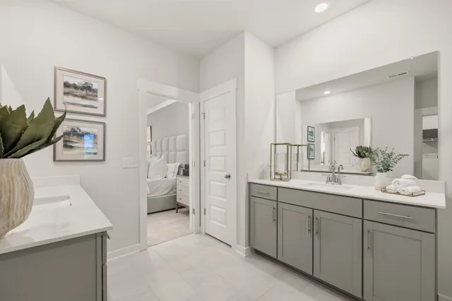 an empty room with wooden floor and cabinet