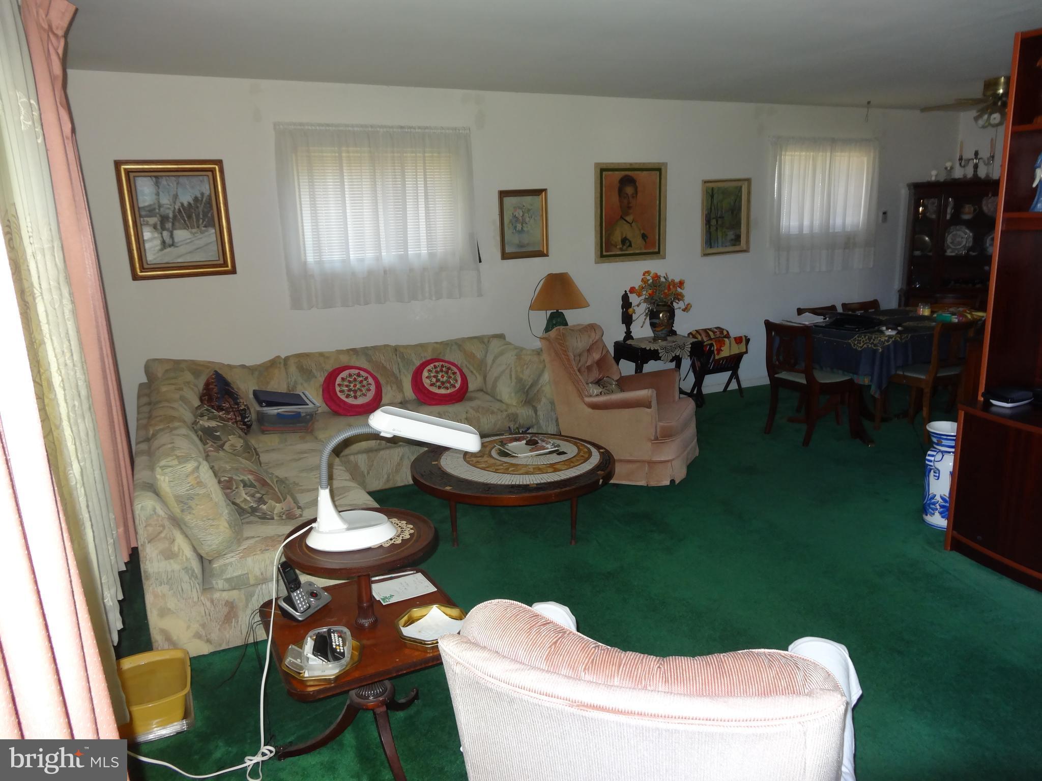 1913 Tadcaster Road Catonsville, MD 21228 - Photo 4 of 30 Living room, with view of dining room.