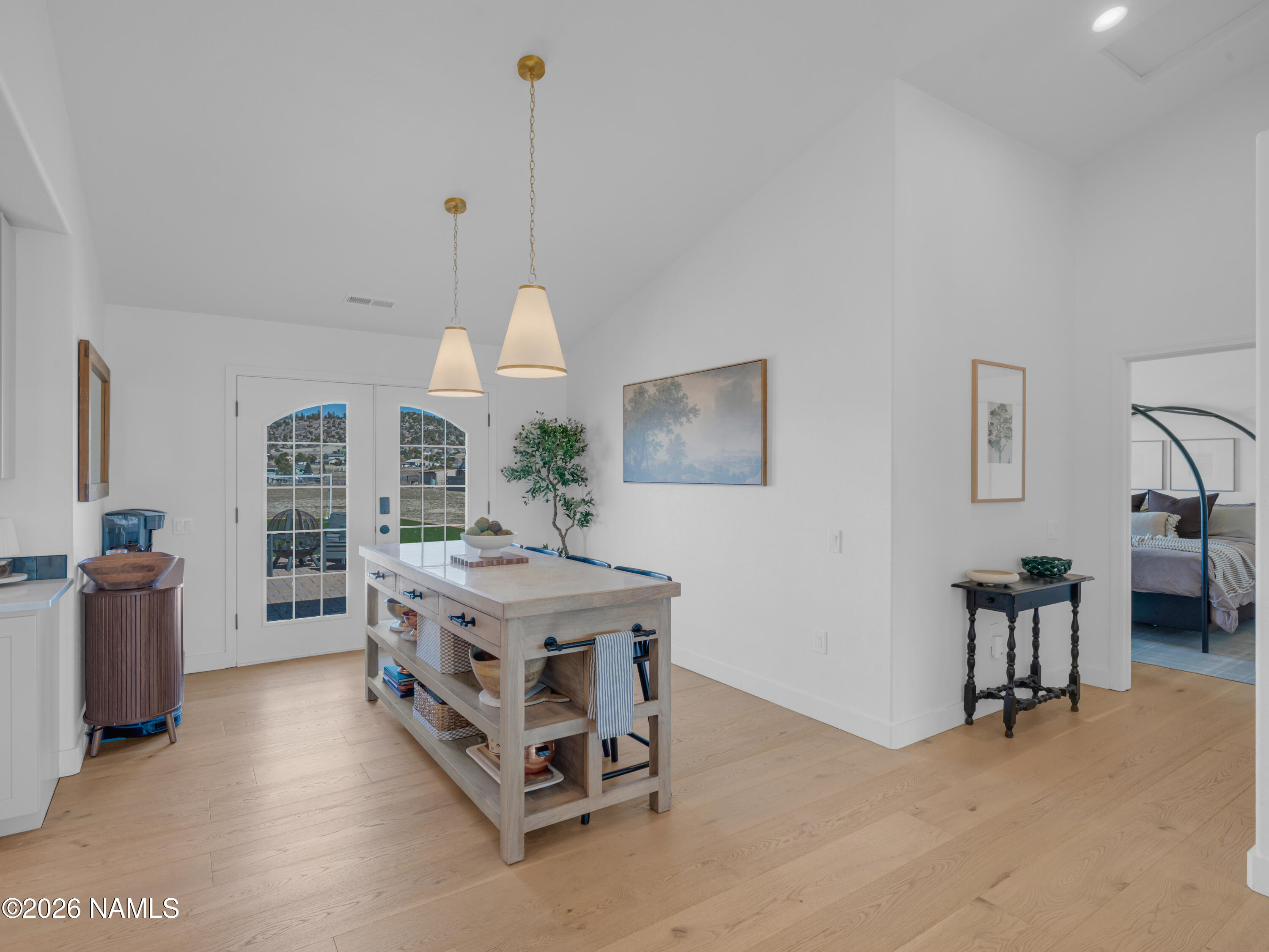 8115 Fawn Run Road Flagstaff, AZ 86004 - Photo 7 of 26 a room with furniture and a chandelier