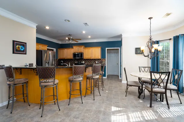 a view of a dining room with furniture