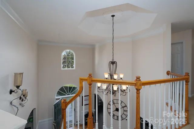 a view of a hallway with windows