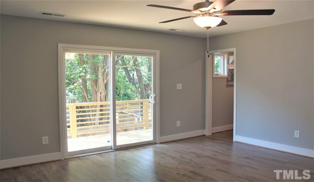 202 Parrish Street Raleigh, NC 27610 - Photo 6 of 14 Master BR with balcony, walk in closet.