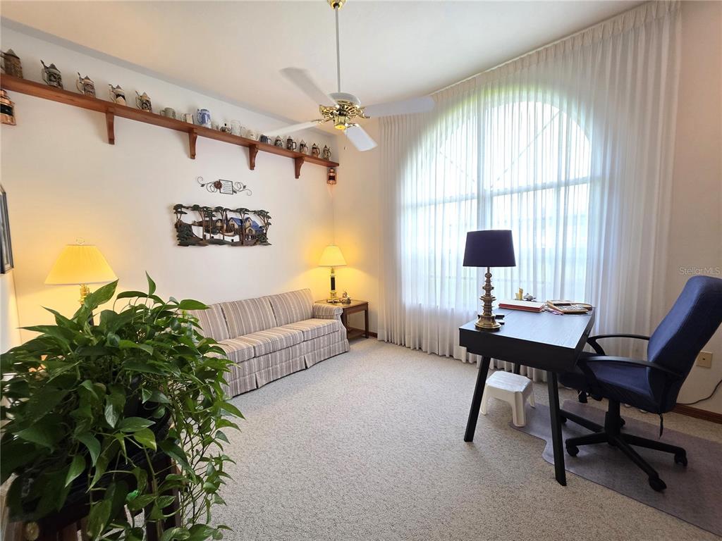 9446 Ashley Drive Weeki Wachee, FL 34613 - Photo 26 of 45 a living room with furniture and a window