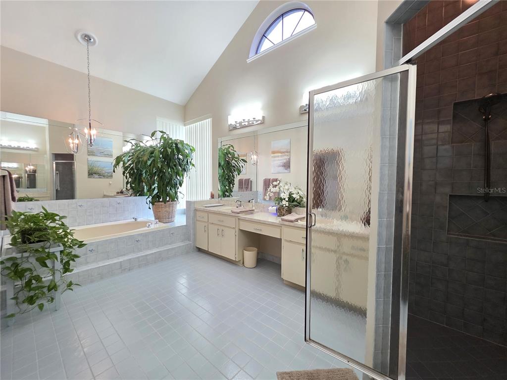 9446 Ashley Drive Weeki Wachee, FL 34613 - Photo 29 of 45 a large white kitchen with a large tub and sink