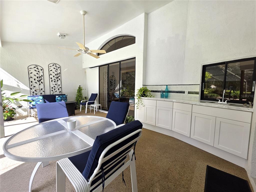 9446 Ashley Drive Weeki Wachee, FL 34613 - Photo 34 of 45 a view of kitchen with sink and breakfast area
