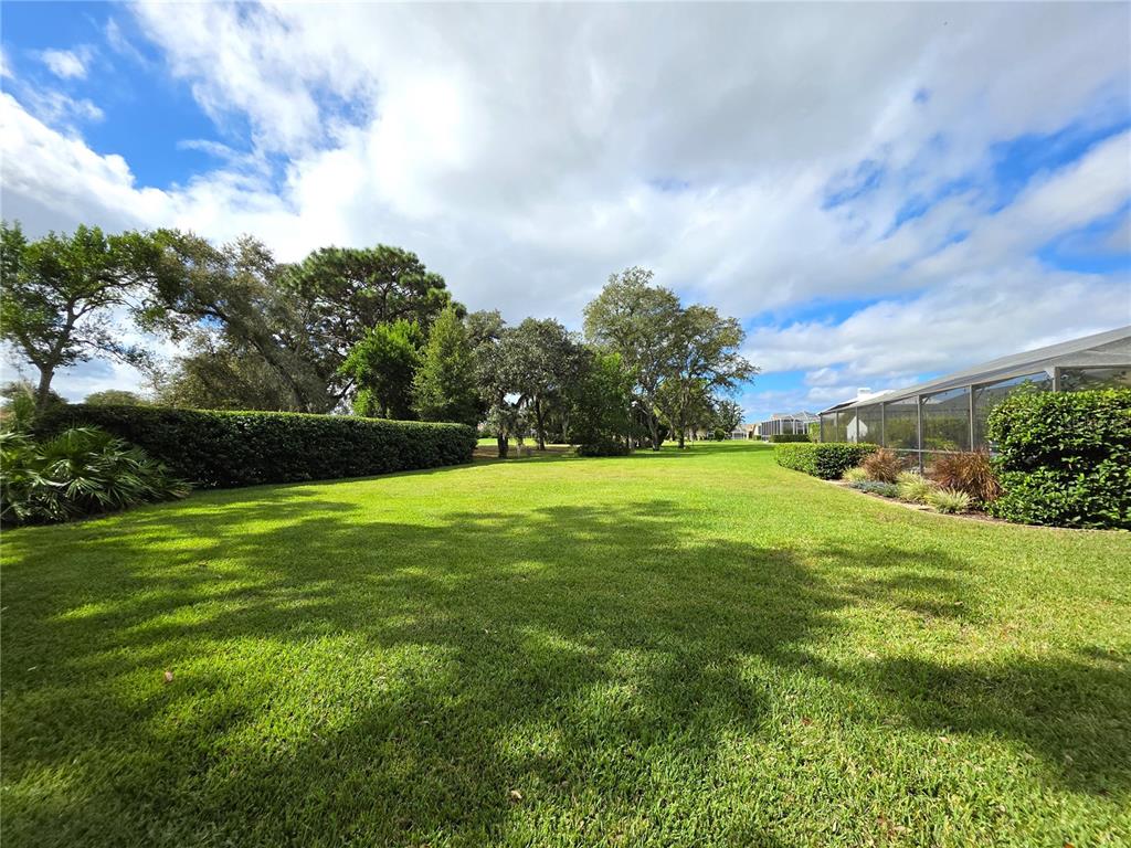 9446 Ashley Drive Weeki Wachee, FL 34613 - Photo 43 of 45 a view of building with outdoor space