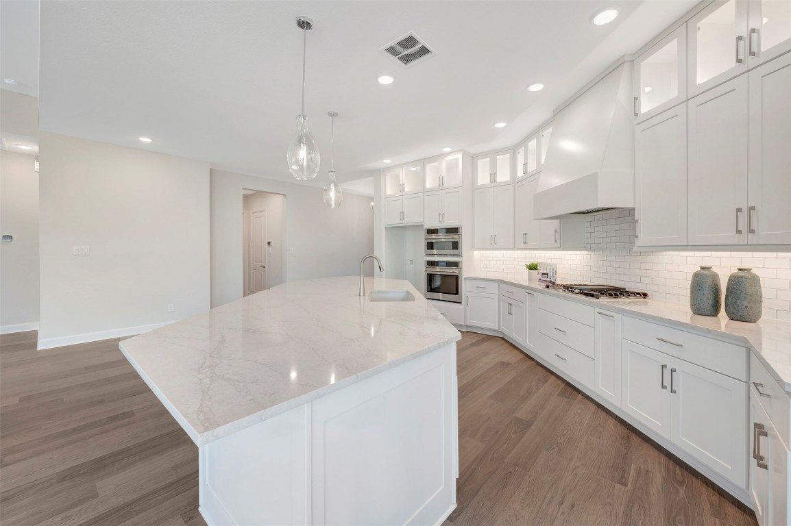 1728 Howler Way Montgomery, TX 77316 - Photo 14 of 42 The LED ribbon, lighting really compliments the look of this kitchen