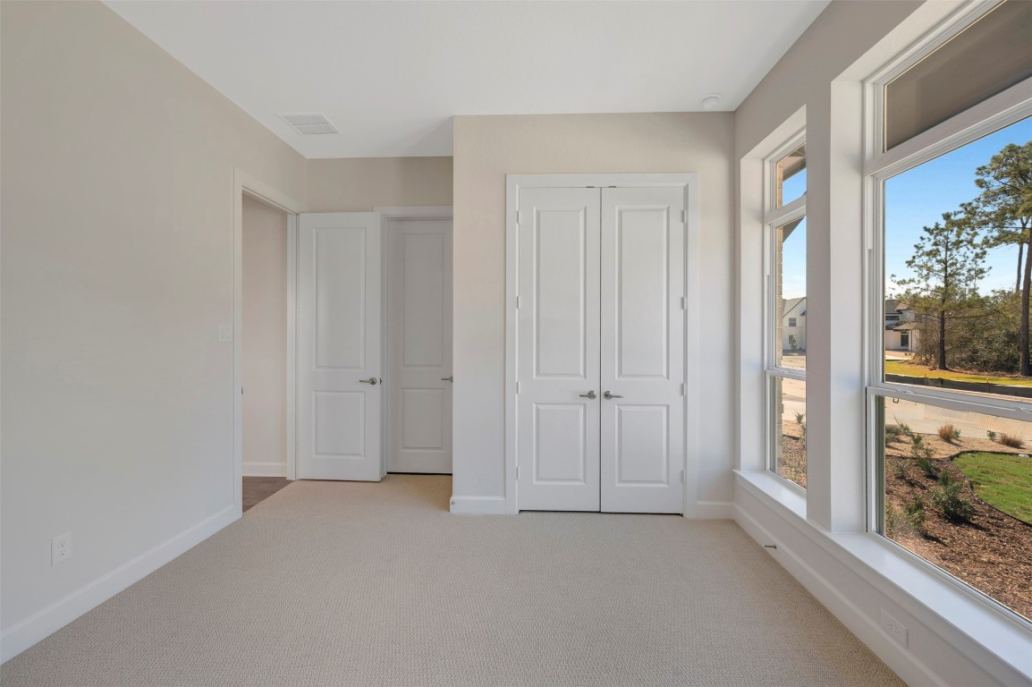 1728 Howler Way Montgomery, TX 77316 - Photo 17 of 42 Front bedroom with en suite bath