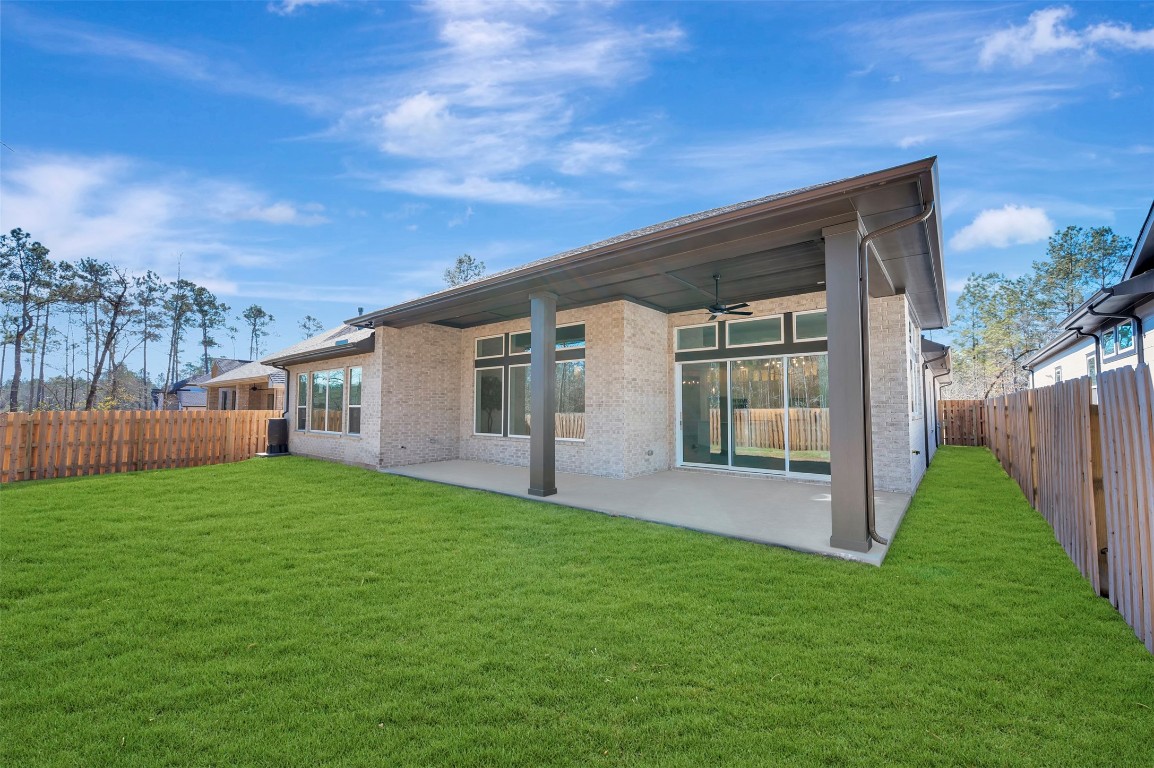 1728 Howler Way Montgomery, TX 77316 - Photo 27 of 42 Spacious real yard is fully sorted with sprinkler system has no rear neighbors