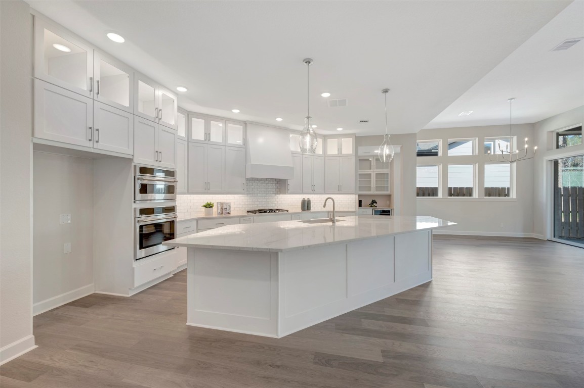 1728 Howler Way Montgomery, TX 77316 - Photo 10 of 42 Gorgeous kitchen with huge oversized island/breakfast bar and cabinets that sore to the ceiling