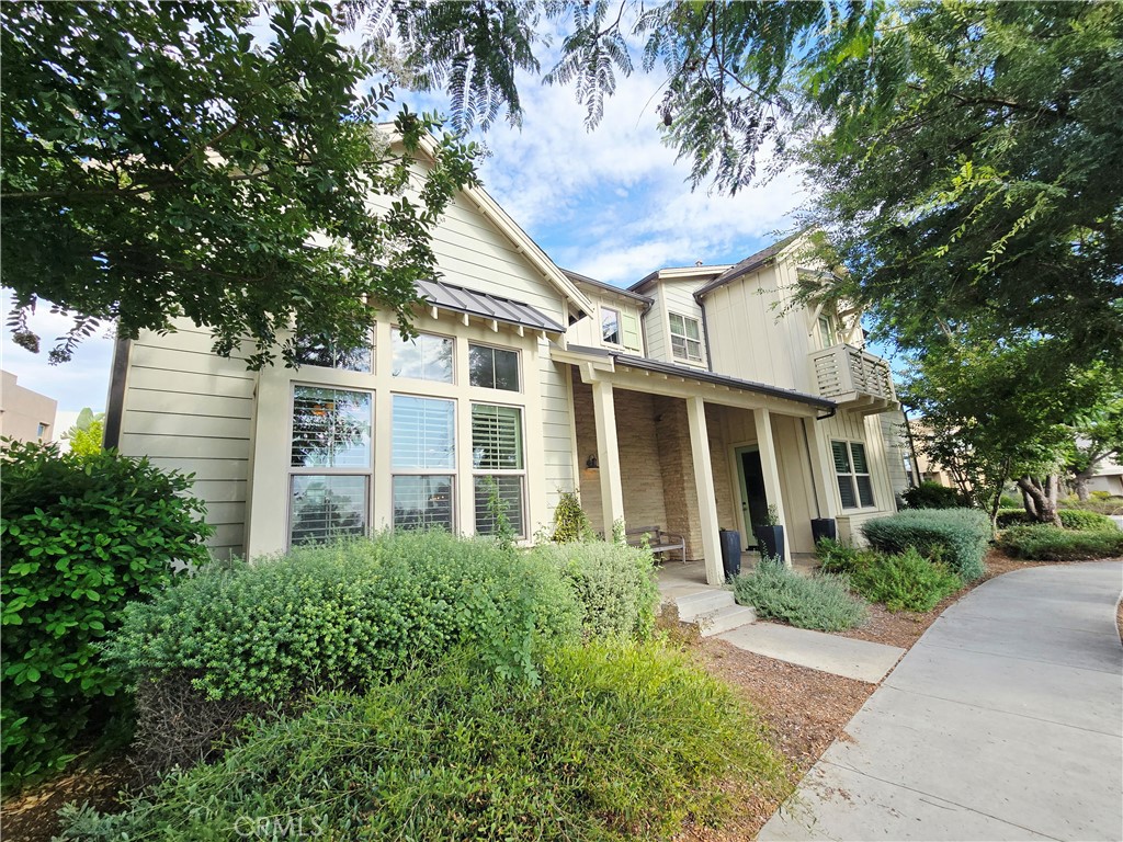 101 Newall Irvine, CA 92618 - Photo 2 of 24 front view of a house with a garden