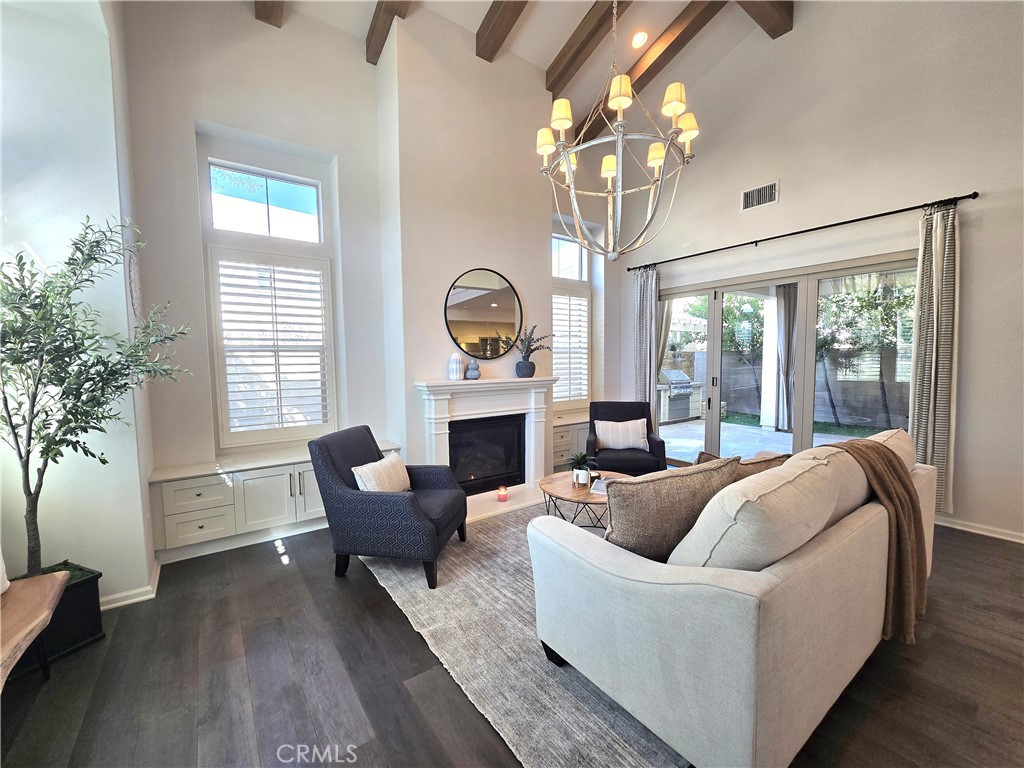 101 Newall Irvine, CA 92618 - Photo 7 of 24 a living room with furniture and a large window