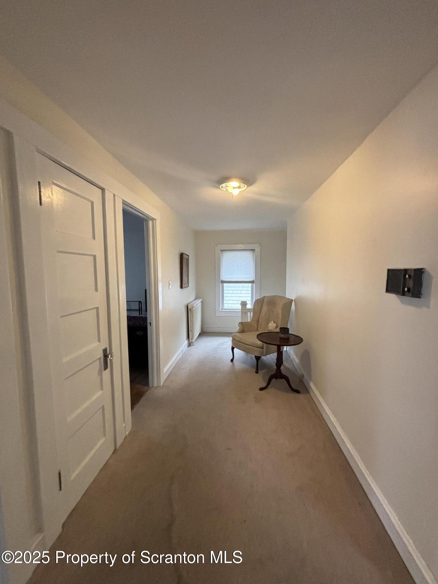 1625 Clay Avenue Dunmore, PA 18509 - Photo 15 of 17 a living room with furniture and a table