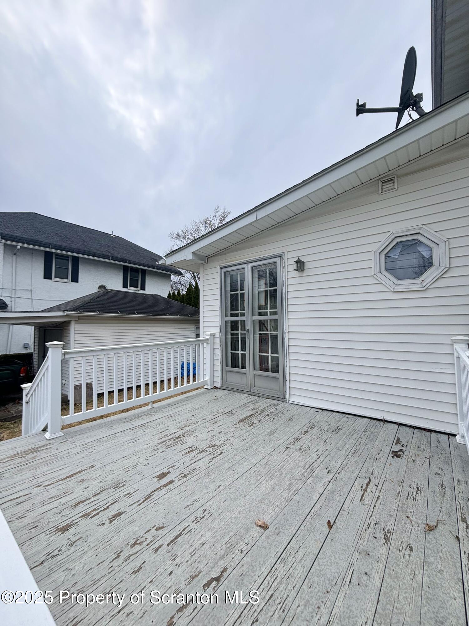 1625 Clay Avenue Dunmore, PA 18509 - Photo 16 of 17 a view of a house with wooden deck