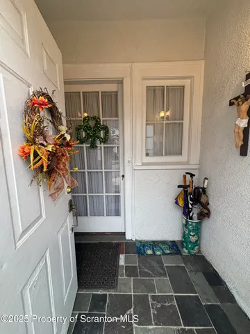 a view of a entryway door of the house