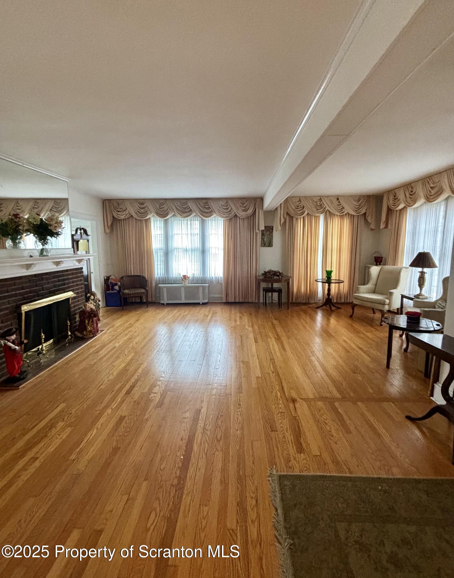 1625 Clay Avenue Dunmore, PA 18509 - Photo 4 of 17 a living room with furniture and a fireplace